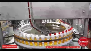 دستگاه پرکن و دربند مخصوص شیشه روغن و سس / 09152000050