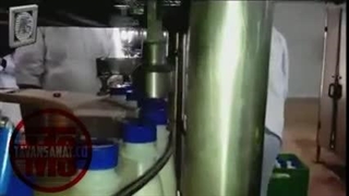 دستگاه پرکن ، سیلکن و دربندی مخصوص شیر و دوغ توان صنعت / 09152000050