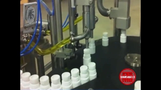 دستگاه پرکن و دربند روغن 40CC تمام اتوماتیک توان صنعت / 09152000050