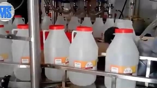 دستگاه پرکن دبه 15 لیتری سرکه توان صنعت / 09152000050