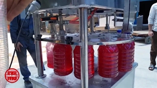 دستگاه پرکن و دربند 4 لیتری توان صنعت / 09152000050